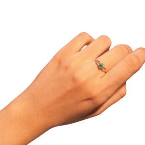 Gold ring with emerald light